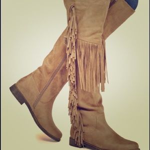 Knee high fringe boot